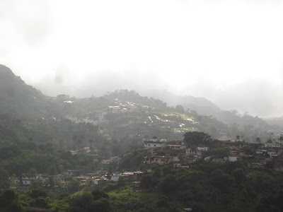 "Water works with hills in the background."