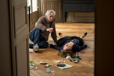 Paul Verhoeven and Isabelle Huppert on the set of Elle