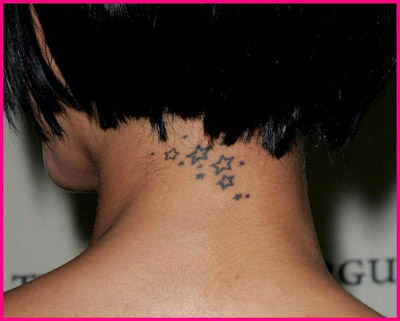 rihanna tattoos neck. back of neck tattoos. rihanna