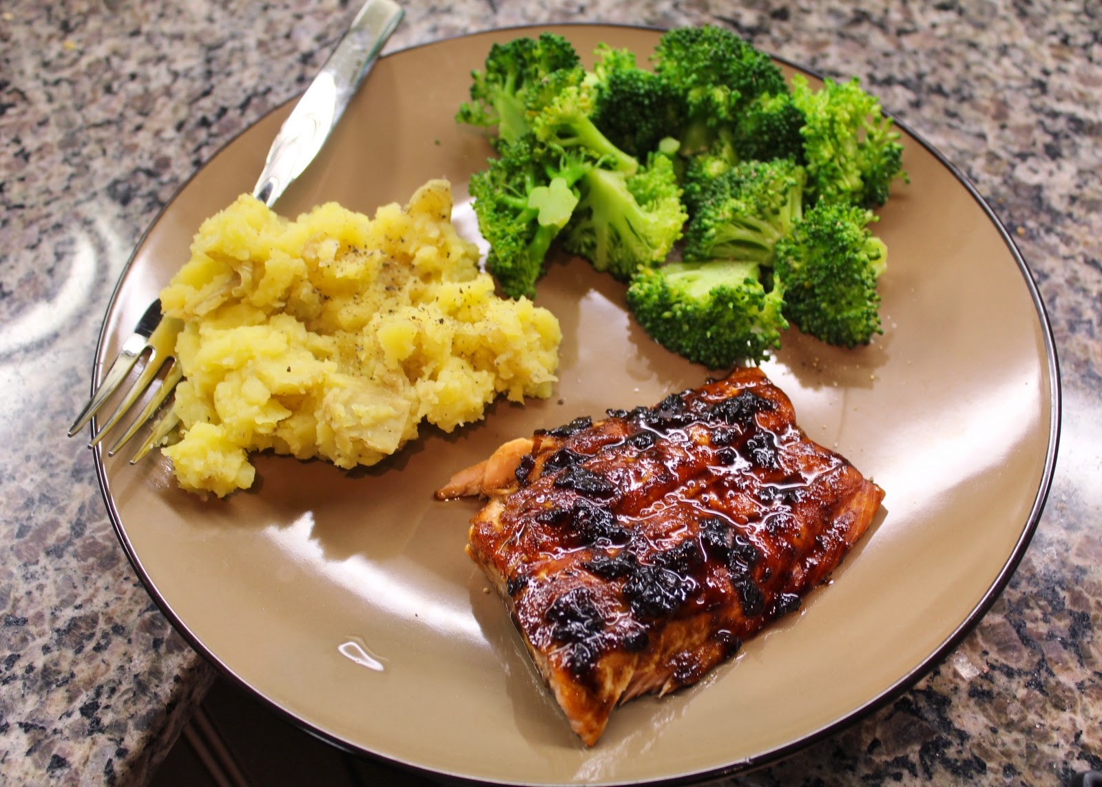 Salmon, mashed potatoes, and broccoli