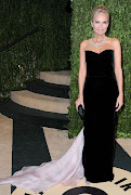 . another gown, this time a black velvet number by Giorgio Armani.