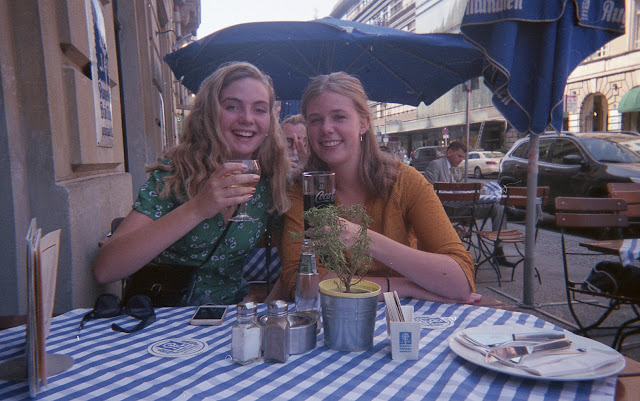 Two girls having a drink