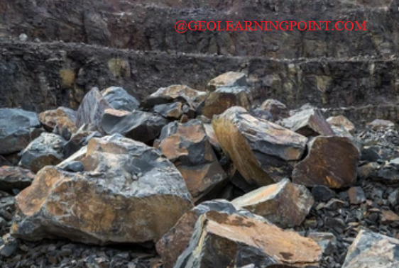 Andesite stone quarry in Carpathian mountains. Natural stone resources for constructing and building.