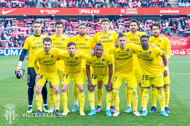 VILLARREAL C. F. Temporada 2021-22. Sergio Asenjo, Aissa Mandi, Danjuma, Pau Torres, Iborra, Dani Parejo. Manu Trigueros, Yéremy Pino, Estupiñan, Giovani Lo Celso, Aurier. Los jugadores llevan camisetas de apoyo al vicepresidente José Manuel Llaneza, diagnosticado de leucemia. GRANADA C. F. 1 VILLARREAL C. F. 4 Sábado 19/02/2022, 14:00 horas. Campeonato de Liga de 1ª División, jornada 25. Granada, estadio Nuevo Los Cármenes: 13.389 espectadores. GOLES: 0-1: 35’, Danjuma, de penalti. 0-2: 39’, Danjuma. 1-2: 61’, Luis Milla, de penalti. 1-3: 81’, Danjuma, de penalti. 1-4: 90+6’, Moi Gómez.