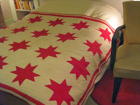 Red and white antique quilt