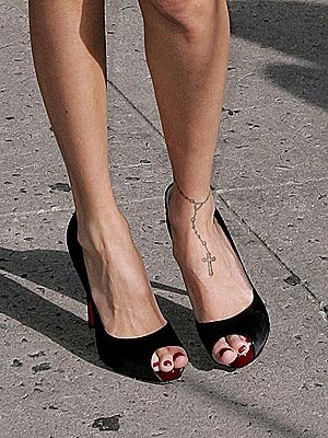 of Megan Fox who has a delightful crescent moon and star on her ankle