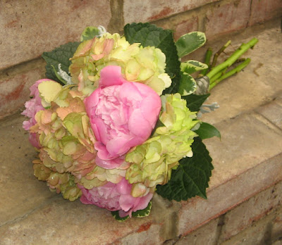 Tiny seashells accent this vibrant bouquet Sage green hydrangea medium 