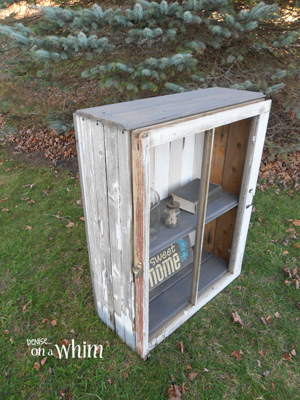 Rustic Cabinet Made with a Chippy Old Window and Weathered Wood Siding | Denise on a Whim