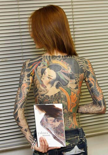 Girl with Japanese back tattoo