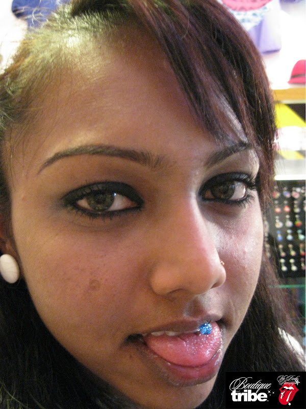 Tongue piercing title=