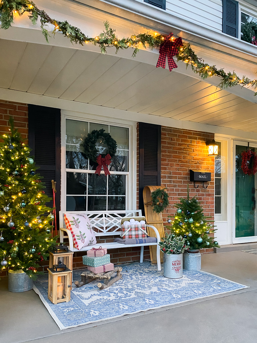 christmas porch decorations with porch trees, outdoor bench, christmas decorations