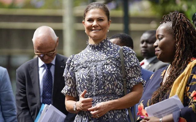 Crown Princess Victoria wore a new iro short sleeve printed maxi dress from By Malina. Pearl earrings