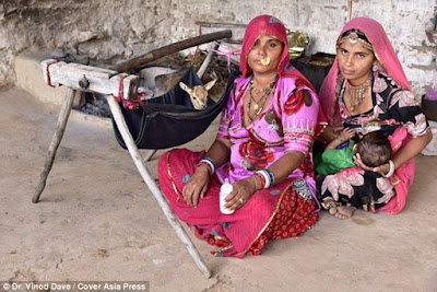 Meet The Indian Tribeswomen Who Breastfeed Deer Alongside Their Children. [SHOCKING PHOTOS] The Bishnoi mothers 6