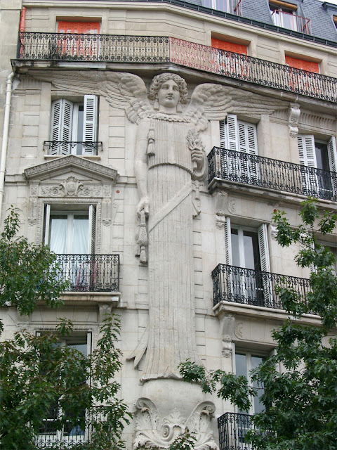 Caryatid angel, 57 rue de Turbigo, Paris