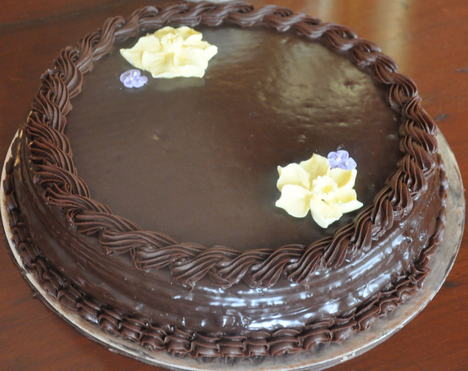 chocolate ganache cake decorations chocolate cake with chocolate ganache with royal icing flowers