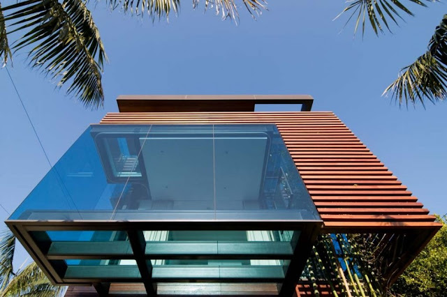 Glass facade with glass floor inside 