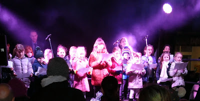 Choir members singing their hearts out at the Brigg Christmas lights switch-on 2018 - picture on Nigel Fisher's Brigg Blog