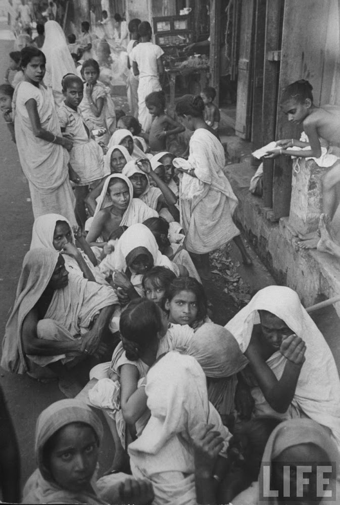 Starving women waiting for the government controlled Grain Shop to open