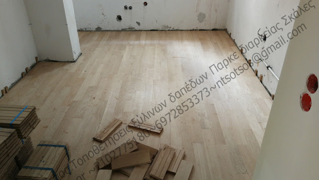 Κολλητό μασίφ ξύλινο πάτωμα πάνω σε τσιμεντοκονία