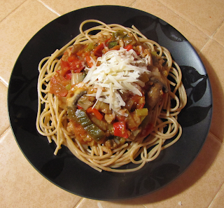 Plate of Pasta With Homemade Sauce Topped with Cheese