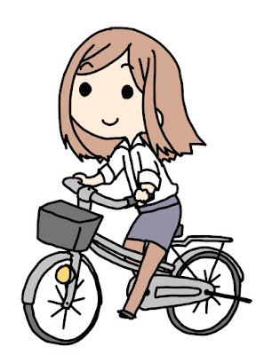 自転車を爽快に運転する女性