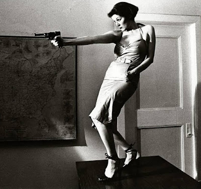 Patti Astor with a gun