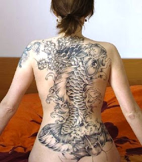 new iguana tattoo design for female on back body