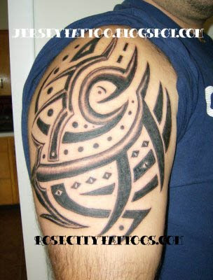 Tribal arm tattoo