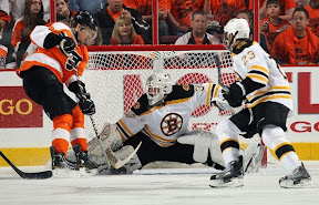 Tim Thomas makes a save