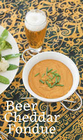 Food Lust People Love: Beer Cheddar Fondue is made with sharp cheddar cheese mixed and melted with beer. You won't be able to stop dipping in till it's gone. Serve with lightly steamed vegetables and/or crusty bread. A great snack or, indeed, meal!