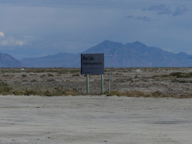 00: sign among flat land