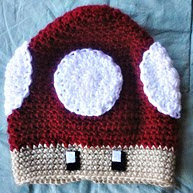 http://www.ravelry.com/patterns/library/mario-mushroom-hat-2