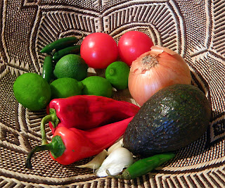 Basket of Limes, Jalapenos, Red Sweet Peppers, Avocado, onion, Tomatoes and Garlic