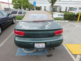 Peeling clear coat on Chrysler Sebring Convertible before repainting at Almost Everything Auto Body