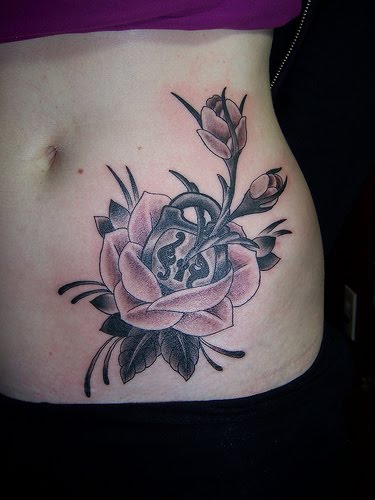 rose tattoos on hip. Rose Hip Tattoos