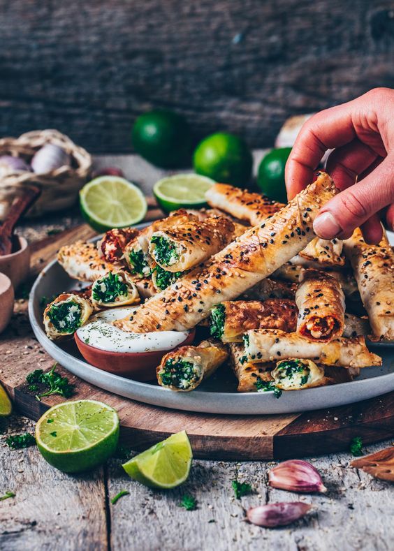 Crispy baked Turkish Borek (Vegan Spinach Rolls) is quick & easy to prepare and make great finger food! Serve to a party or just as a simple snack or side dish for dinner or lunch.