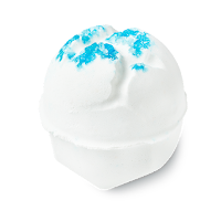 A white spherical bath bomb with blue on the inside and blue salt on top on a bright background