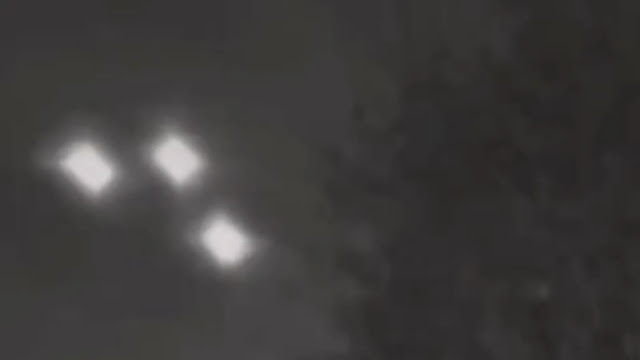 A close up of the Triangle shaped UFO TR3B flying over people's homes in the UK caught on a doorbell camera.