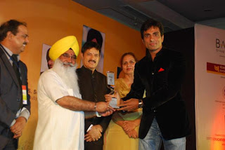 S Sewa Singh  Sekhnwan awarding Sonu Sood