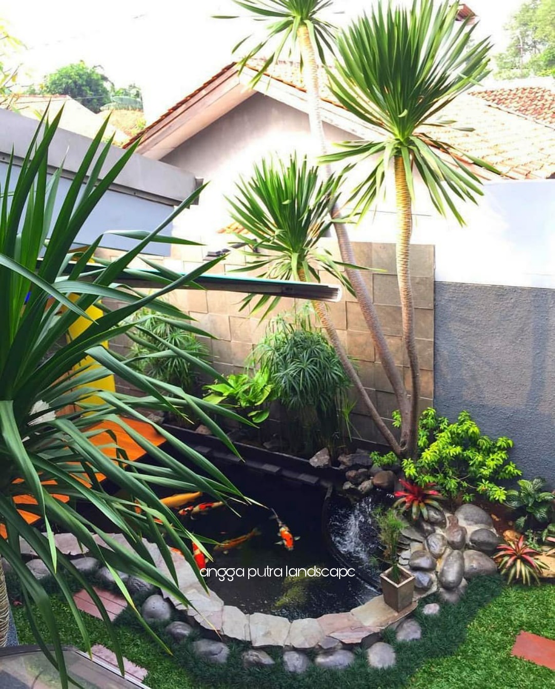 Jasa pembuatan dekorasi kolam tebing,dekorasi relief air terjun mojokerto