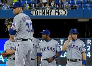 Darren O'Day blows the game in Kason Gabbard's jersey