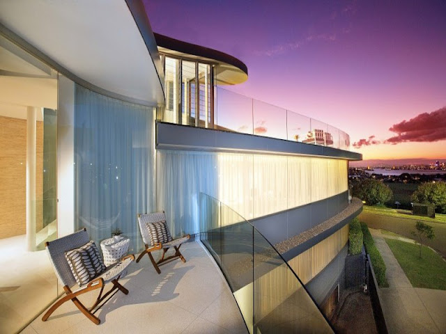 Modern house from the terrace at sunset