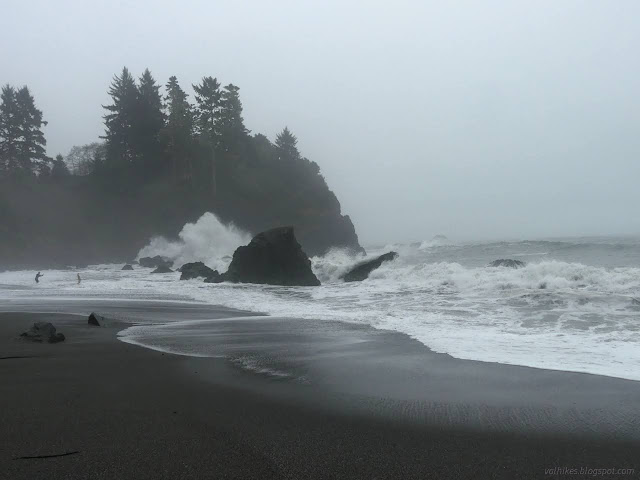 21: a couple fellows in the water with the big waves