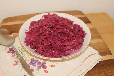 German sweet and sour red cabbage ready to serve with a spoon.