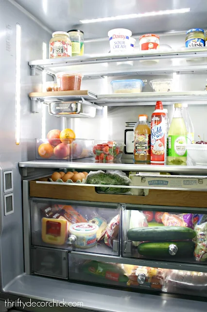 Refrigerator with wood accents 