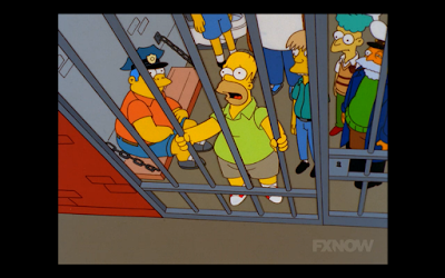 Homer in Super Bowl Jail.