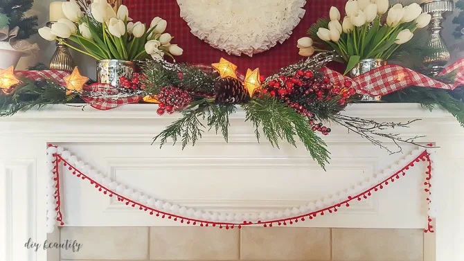 I'm sharing some tips for decorating a festive Christmas mantle sure to get you in the holiday spirit! See more at diy beautify!