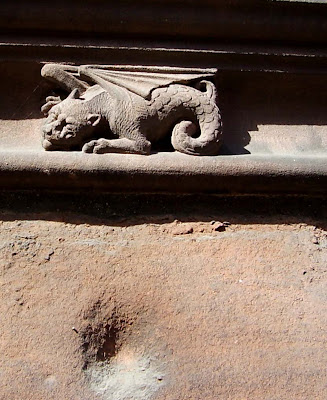 griffin outside the entrance to chester cathedral