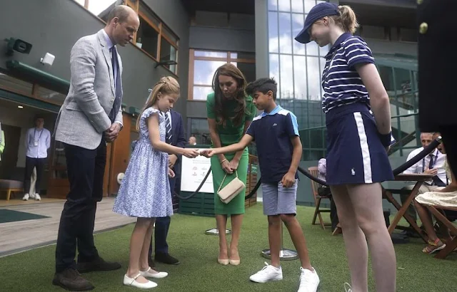 Princess of Wales wore a new short sleeve stretch cady midi dress by Roland Mouret. Princess Charlotte wore a new dress by Friki
