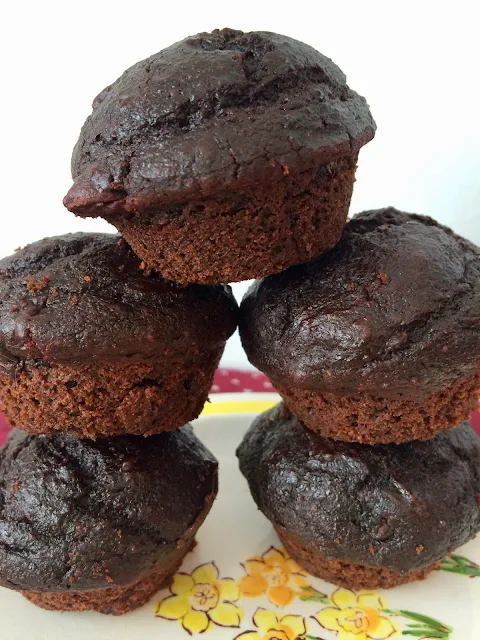 Stacked chocolate beet mini muffins.